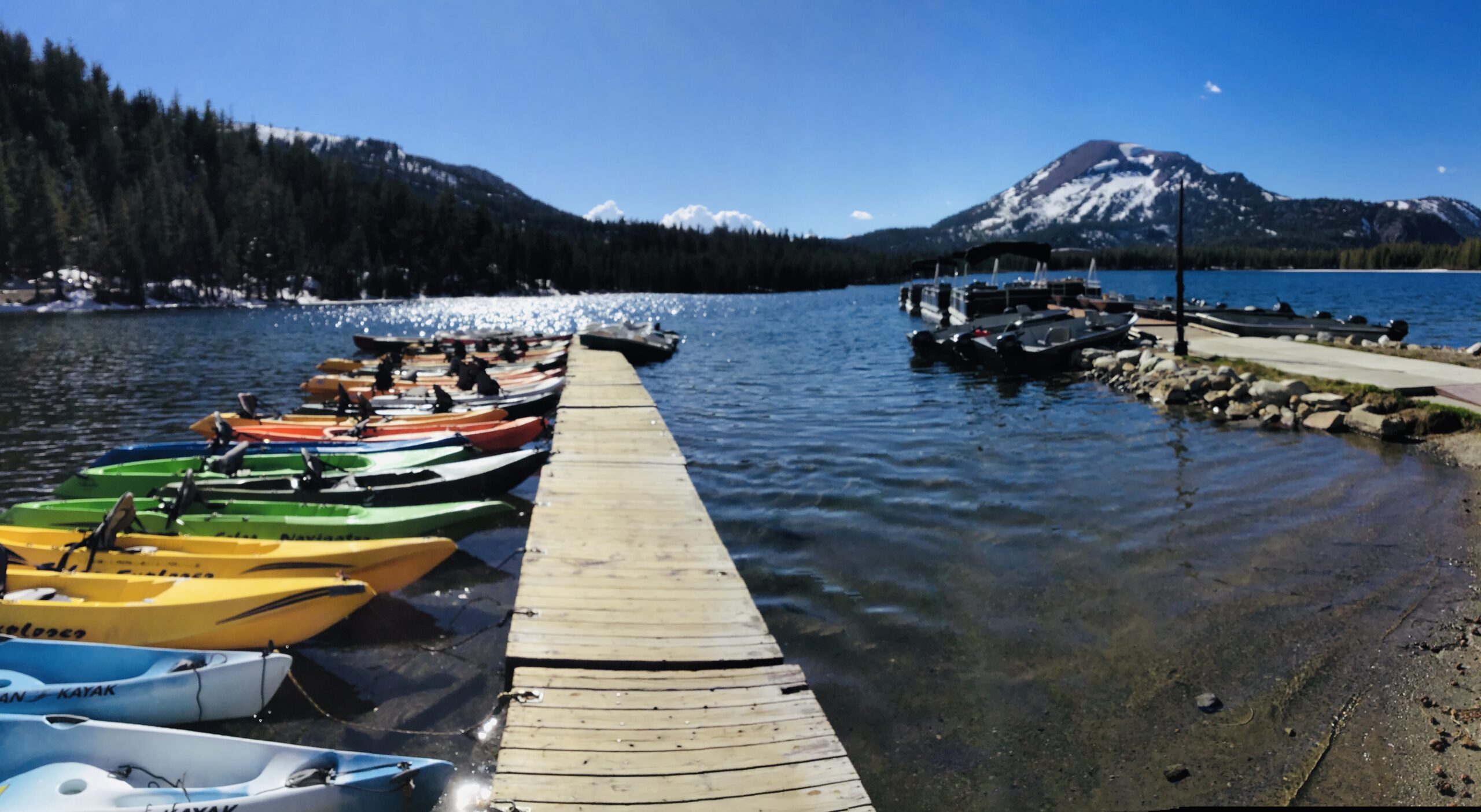 Photo of colorful kayaks on a dock